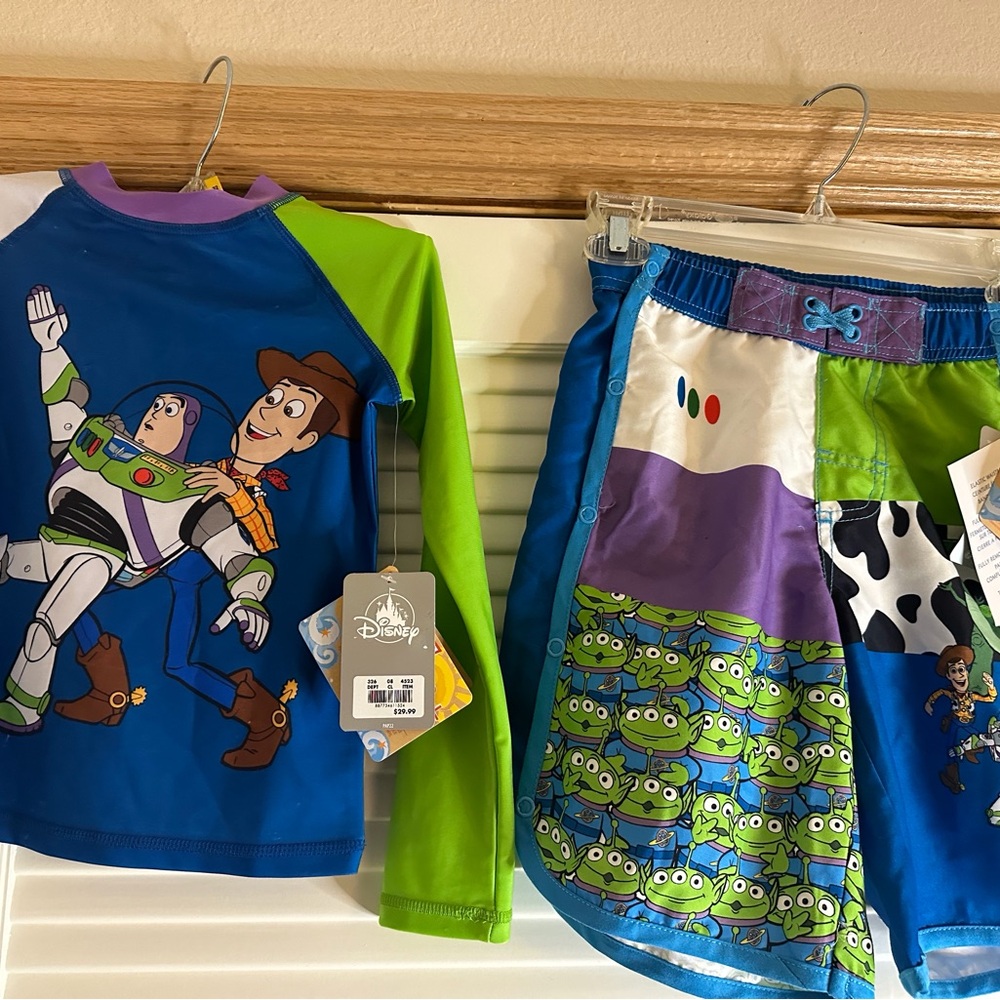 Disney swim shorts and top.